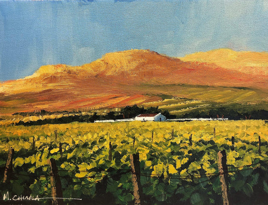 oil painting of grape vineyards and a farmhouse in the distance, below the mountain.