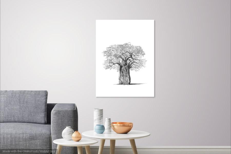 A fine art print of a Baobab Tree with a bushbuck by artist Bowen Boshier hanging on a wall above a coffee table